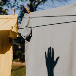 Clothes - Clothes drying on rope with clothespins in garden