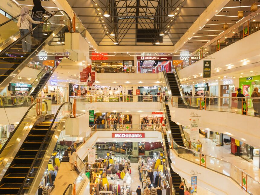 a-mall-filled-with-lots-of-people-and-escalators