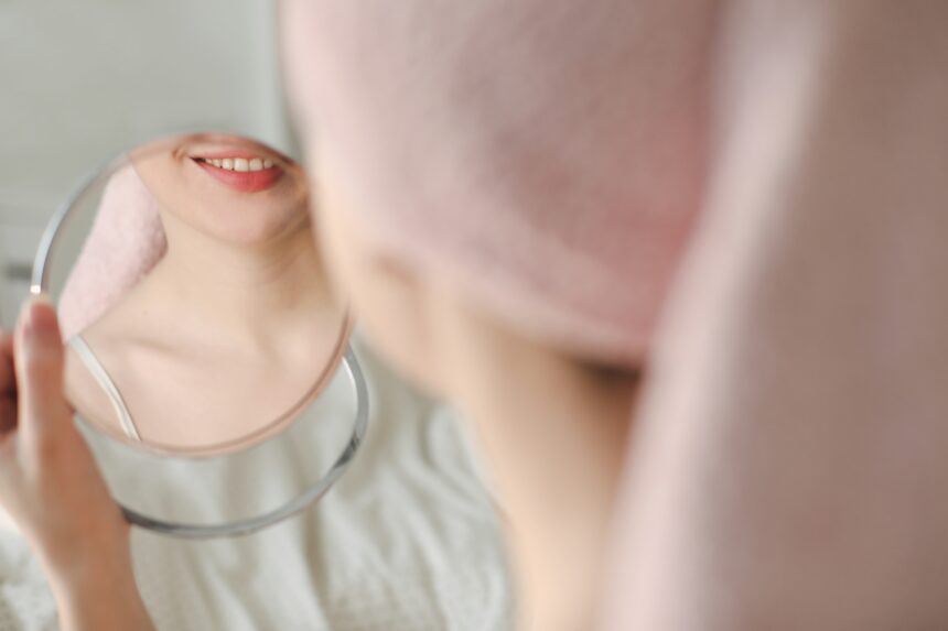 woman in front of a mirror